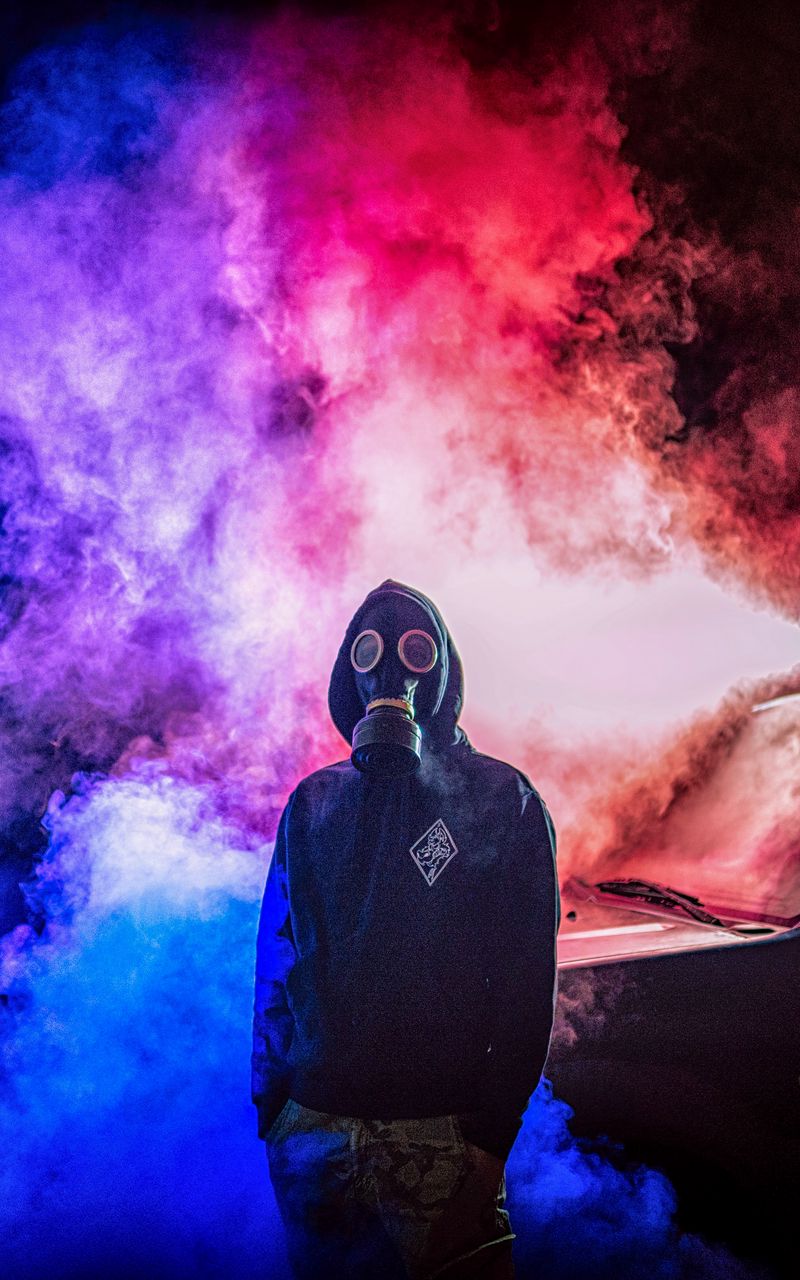 800x1280 Wallpaper gas mask, man, smoke, colorful