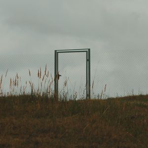 Preview wallpaper gate, fence, minimalism, sky, grass