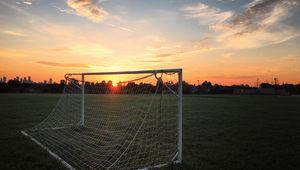 Preview wallpaper gate, net, field, sunset, football, sport