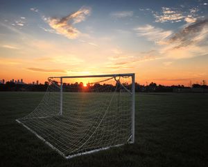 Preview wallpaper gate, net, field, sunset, football, sport