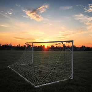 Preview wallpaper gate, net, field, sunset, football, sport
