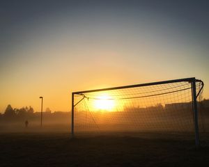 Preview wallpaper gate, net, sun, light, football, dark