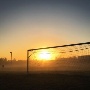 Preview wallpaper gate, net, sun, light, football, dark