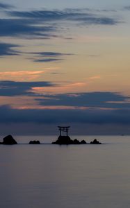 Preview wallpaper gate, rocks, sea, clouds