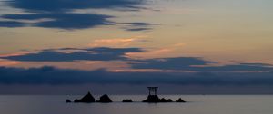 Preview wallpaper gate, rocks, sea, clouds