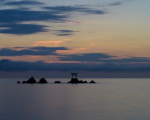 Preview wallpaper gate, rocks, sea, clouds