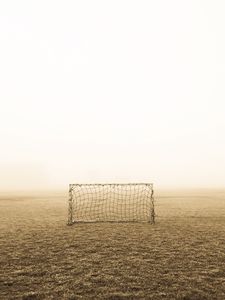 Preview wallpaper gates, fog, lawn, football, alone