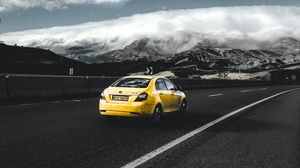 Preview wallpaper geely, car, rear view, yellow, road