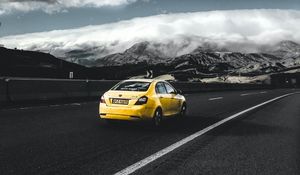 Preview wallpaper geely, car, rear view, yellow, road