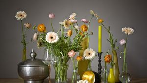 Preview wallpaper gerbera, ranunkulyus, flowers, glasses, candles, vases, decoration