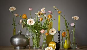 Preview wallpaper gerbera, ranunkulyus, flowers, glasses, candles, vases, decoration