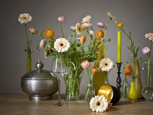 Preview wallpaper gerbera, ranunkulyus, flowers, glasses, candles, vases, decoration