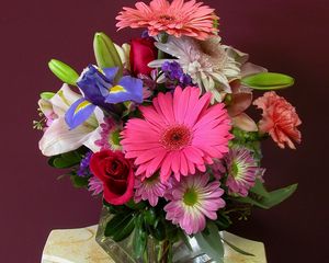 Preview wallpaper gerberas, irises, roses, carnation, bouquet, vase