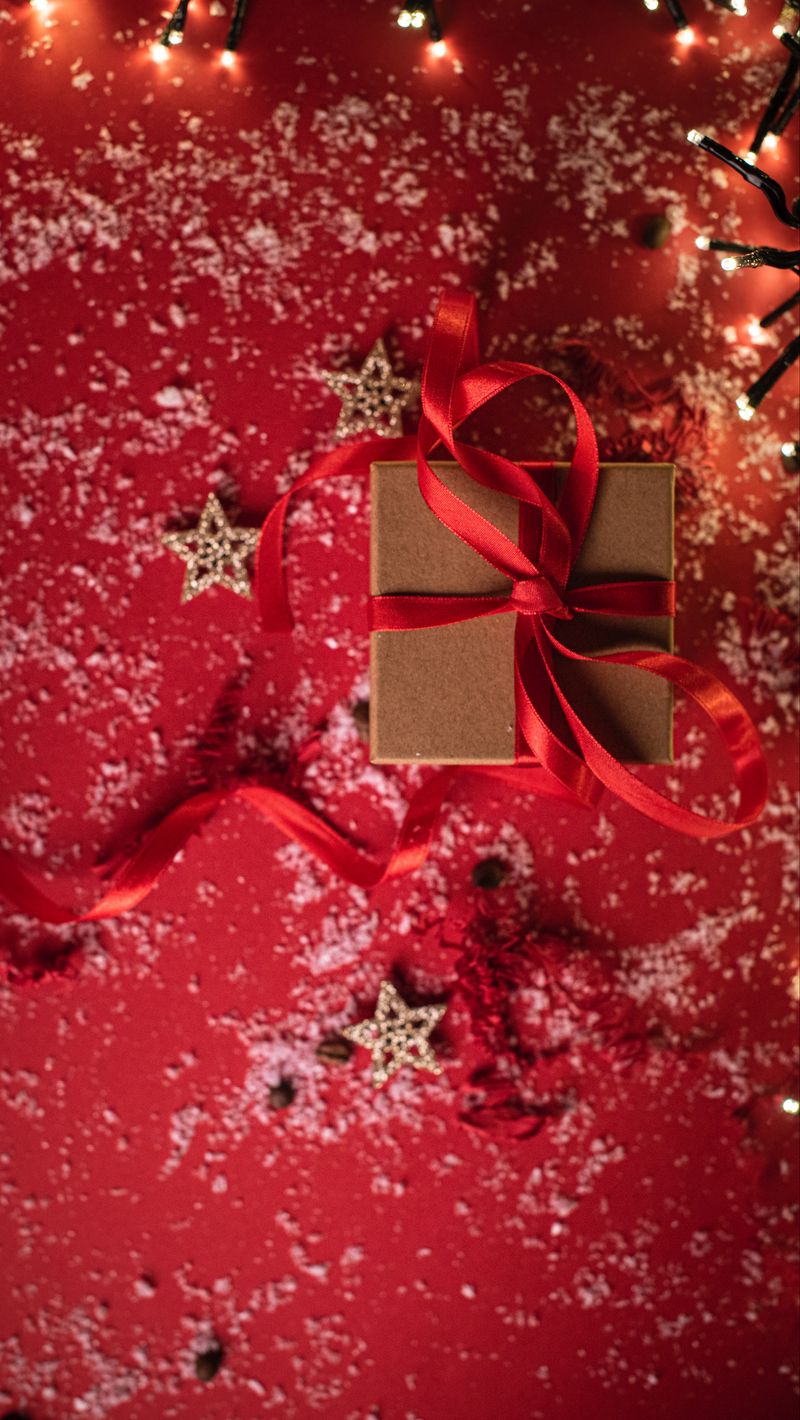 800x1420 Wallpaper gift, box, ribbon, stars, snow, holiday