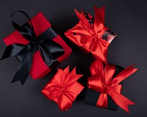 Preview wallpaper gifts, boxes, ribbons, red, black