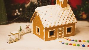 Preview wallpaper gingerbread house, pastries, watering, powder, sprinkling, dessert