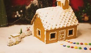 Preview wallpaper gingerbread house, pastries, watering, powder, sprinkling, dessert