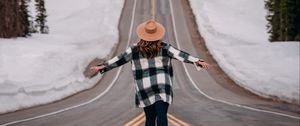 Preview wallpaper girl, alone, freedom, free, road, mountains, snow, winter