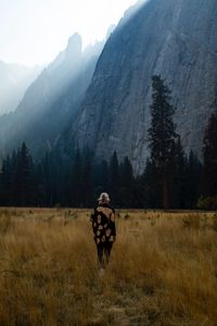 Preview wallpaper girl, alone, nature, mountains, grass