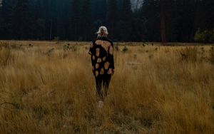 Preview wallpaper girl, alone, nature, mountains, grass