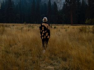 Preview wallpaper girl, alone, nature, mountains, grass