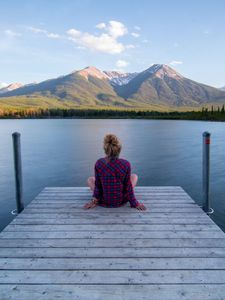 Preview wallpaper girl, alone, pier, water, mountains, view