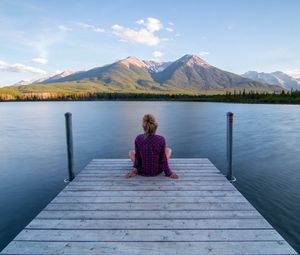 Preview wallpaper girl, alone, pier, water, mountains, view