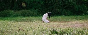 Preview wallpaper girl, alone, sad, field, trees, grass