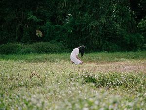 Preview wallpaper girl, alone, sad, field, trees, grass