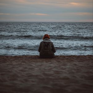 Preview wallpaper girl, alone, shore, beach, sunset