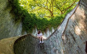 Preview wallpaper girl, architecture, stairs, bottom view, trees