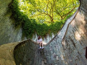 Preview wallpaper girl, architecture, stairs, bottom view, trees