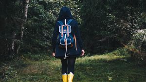 Preview wallpaper girl, backpack, forest, walk, fall