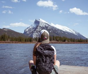 Preview wallpaper girl, backpack, pier, lake, mountain, travel