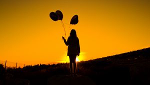 Preview wallpaper girl, balloons, silhouettes, sunset