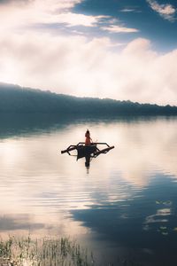 Preview wallpaper girl, boat, lake, alone
