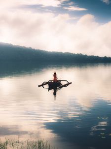 Preview wallpaper girl, boat, lake, alone
