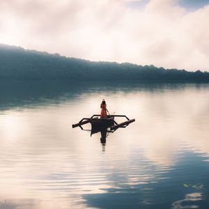 Preview wallpaper girl, boat, lake, alone