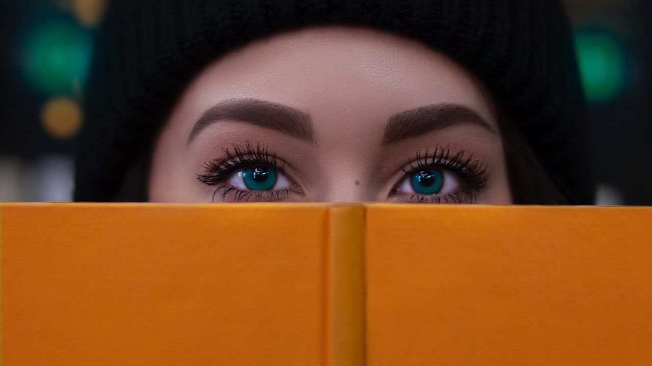 Wallpaper girl, book, glance, eyes, face