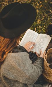 Preview wallpaper girl, book, hat, reading