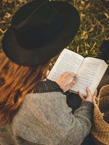 Preview wallpaper girl, book, hat, reading