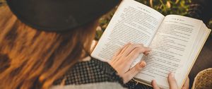 Preview wallpaper girl, book, hat, reading