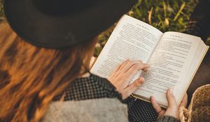 Preview wallpaper girl, book, hat, reading