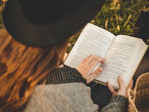 Preview wallpaper girl, book, hat, reading