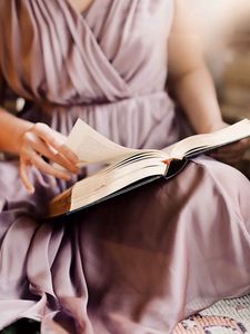 Preview wallpaper girl, book, reading, hand, dress