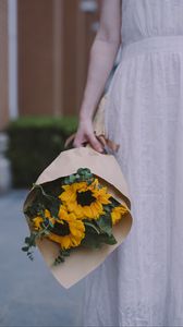 Preview wallpaper girl, bouquet, sunflowers, eucalyptus