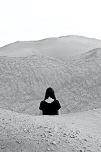 Preview wallpaper girl, bw, sand, hills