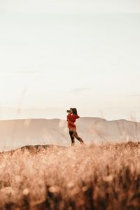 Preview wallpaper girl, camera, field, photographer