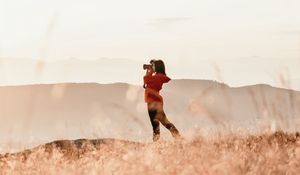 Preview wallpaper girl, camera, field, photographer