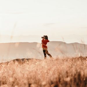 Preview wallpaper girl, camera, field, photographer